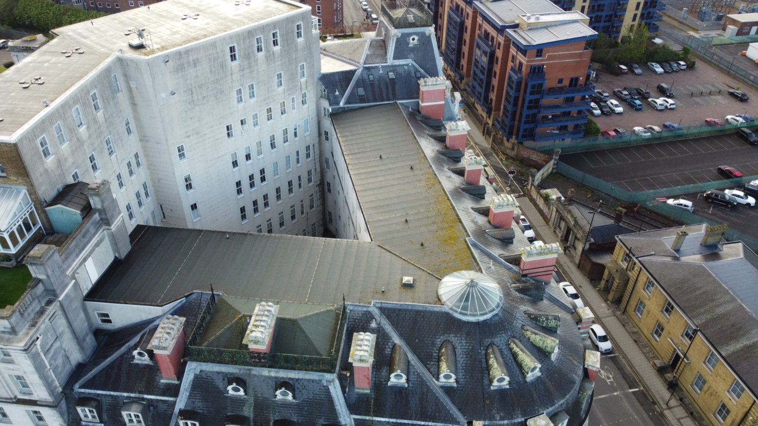 Drone aerial photograph of South Western House Southampton captured during building inspection showing roof and external condition