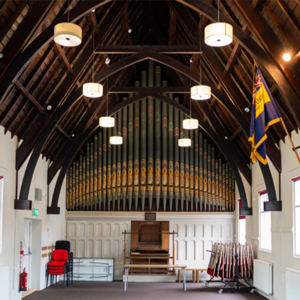 Sandford Heritage Hall Wareham Refurbished heritage hall featuring traditional architecture, pitched roof construction and landscaped external areas within a community setting, Sandford Heritage Hall, Wareham