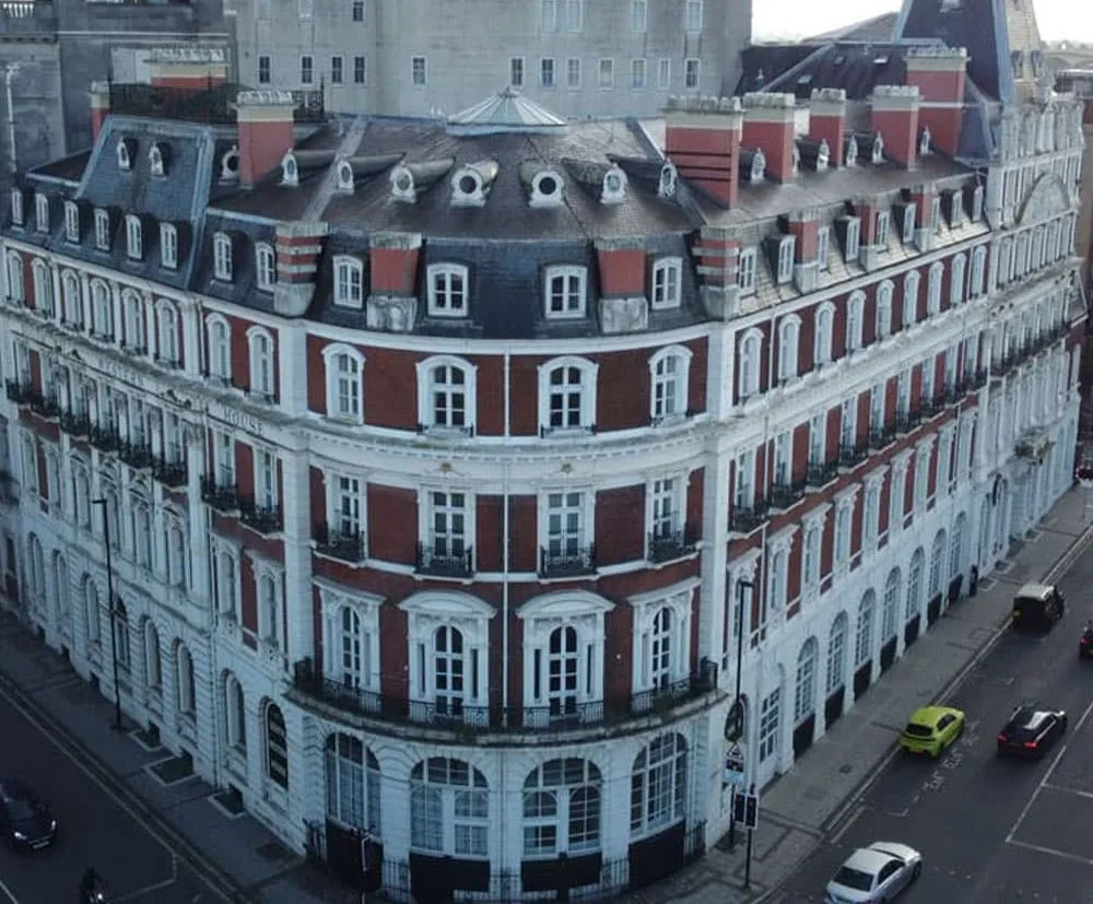 Drone aerial photograph of South Western House, Southampton Hampshire, a historic landmark building featuring traditional architecture and detailed façade on a prominent urban corner site