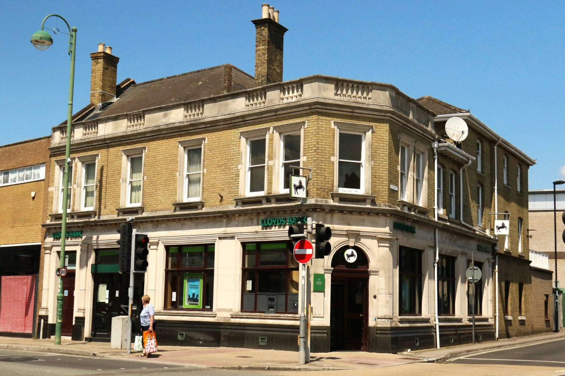 Exterior of former Lloyds Bank building on a high street corner showing traditional commercial property façade