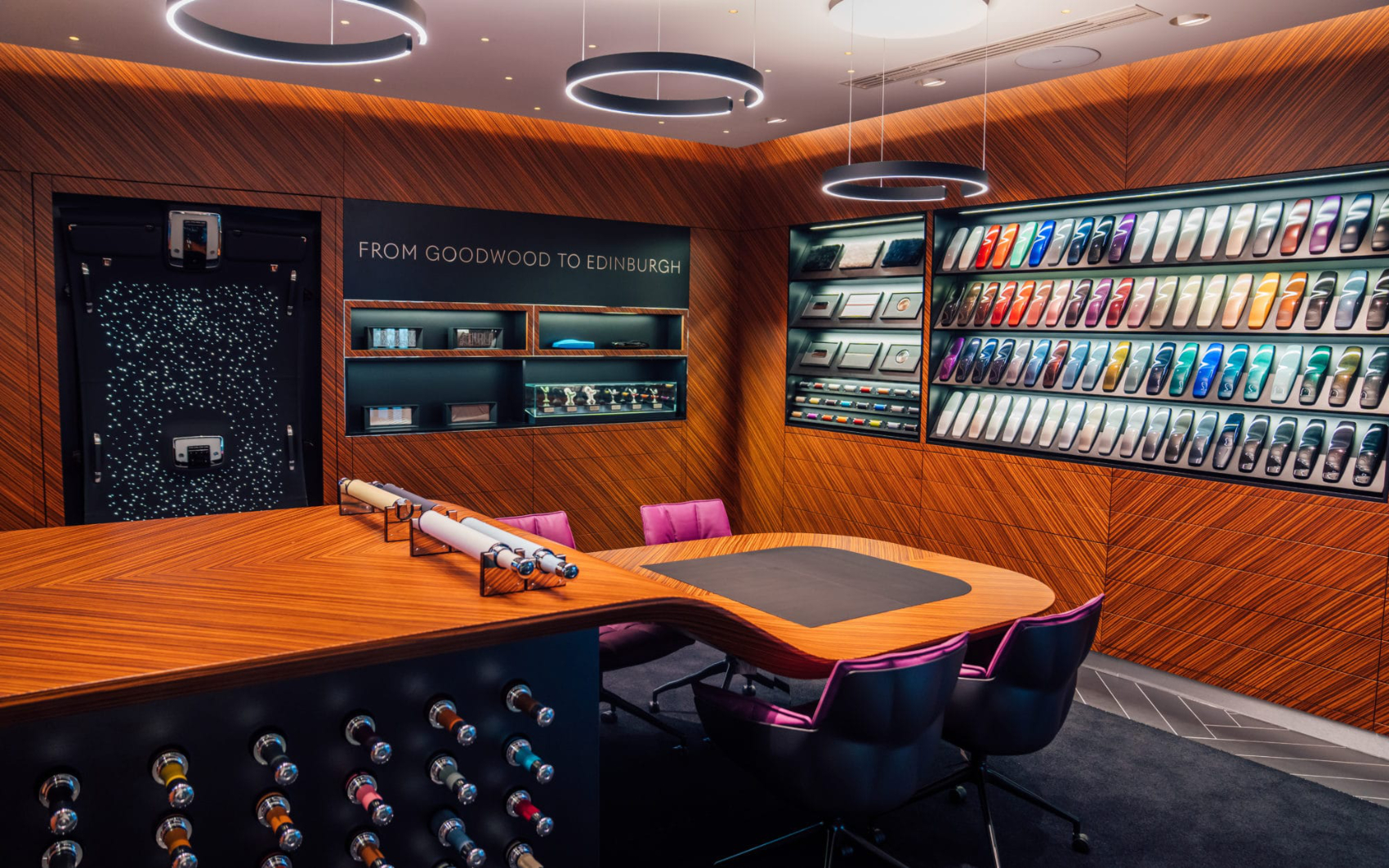 Luxury Rolls-Royce car dealership showroom interior with premium retail fit-out and display area